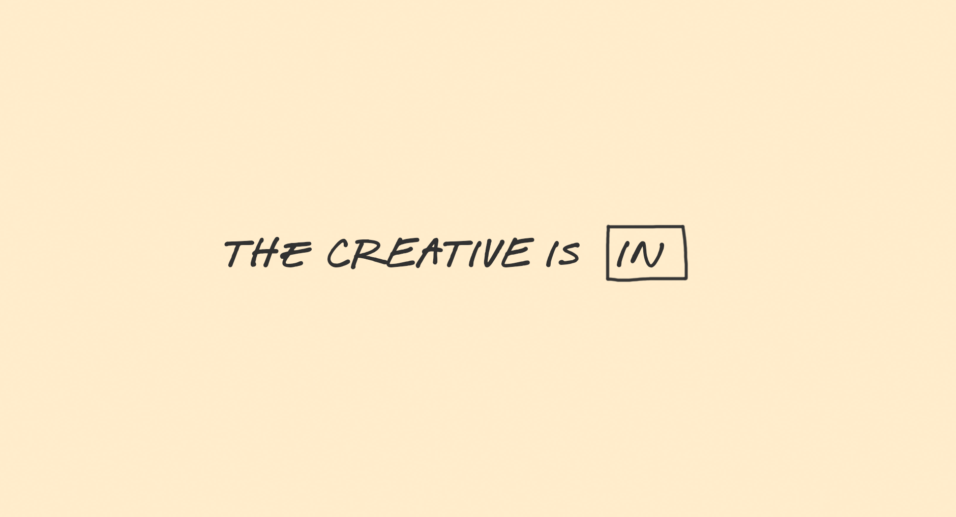 handwritten words "the creative is in"
